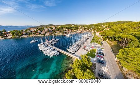 Croatia, Maslinica, 15 September 2019: Drone View Point On Moored In An Equal Row Sailboats At Sunse