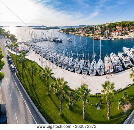 Croatia, Maslinica, 15 September 2019: Drone View Point On Moored In An Equal Row Sailboats At Sunse