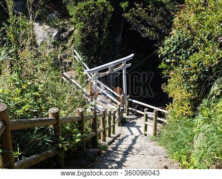 Ashizurimisaki, Japan - April 8, 2018: Stone Steps And Torii Gates Leading To Hakusan Domon Natural 