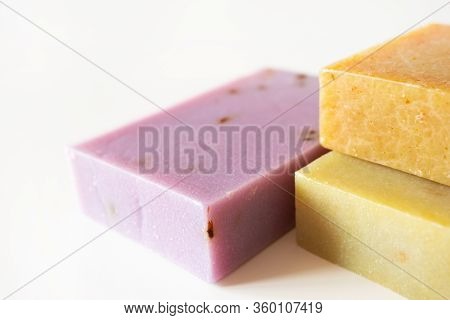 Close-up Handmade Shampoo And Body Barblocks With Selective Focus On White Background. Aromatic Lave