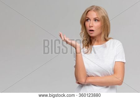Wtf Are You Talking About. Portrait Of Displeased Pissed European Female, Standing In Angry Pose, Sh