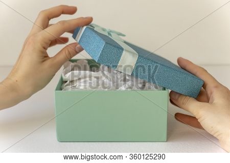 Gift Boxes With Ribbons And On A White Background.