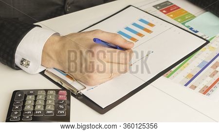 Image Of Male Hand Pointing At Business Document.