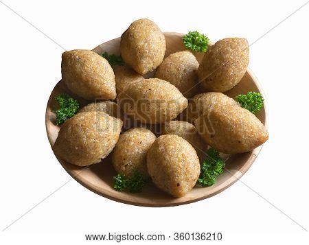 Isolated Arabic Meat Appetizer Kibbeh. Traditional Arabic Kibbeh With Lamb And Pine Nuts.