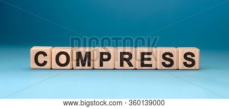 Compressword Cube On A Blue Background. Medical Concept.