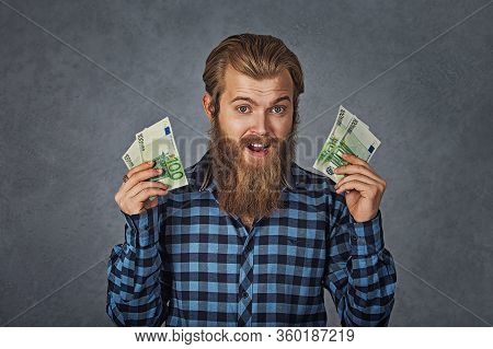 Portrait Happy Young Man With Money Euro Banknotes Ecstatic Celebrates Success Screaming Isolated On