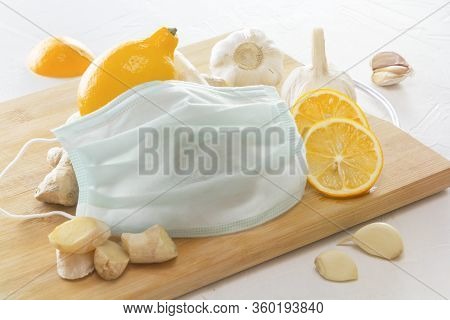 Ginger, Garlic, Lemon And A Medical Mask - A Means To Protect Against Viral Infections And Colds On 