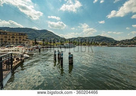 Como, Italy - August 4, 2019: Local People And Tourists On The Promenade Along The Lake In The Cente