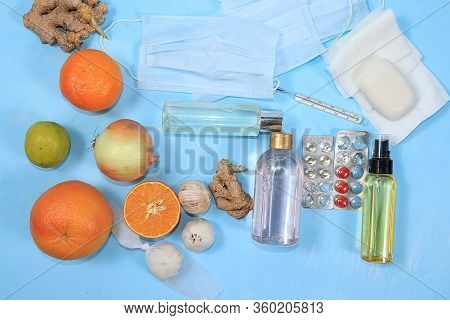 Vials For Hand Disinfection, Medical Masks And Folk Immunostimulants And Vitamins. Coronavirus Prote