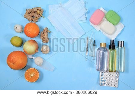 Vials For Hand Disinfection, Medical Masks And Folk Immunostimulants And Vitamins. Coronavirus Prote