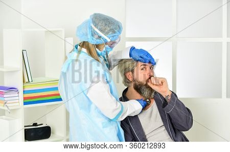 First Symptoms. Covid 19. Diagnosis Of Pneumonia. Sars Concept. Doctor Protective Equipment Examines