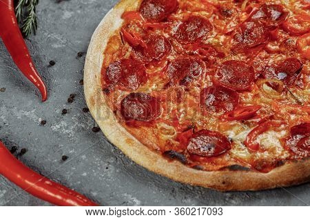 Thinly Sliced Pepperoni Is A Popular Pizza Topping In American-style Pizzerias