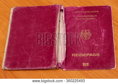 A Shabby, Sloppy Biometric Passport Of A German Citizen. Irresponsible Attitude To The Preservation 