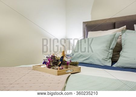 Masterbed In Interior Of The Modern Luxure Bedroom In Studio Apartments In Light Color Style