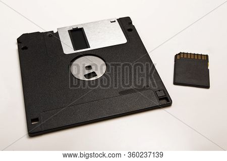 Old Computer Technology Floppy Disk In Comparison With Sd Card