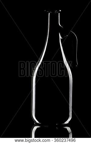 Decanter On The Black Background