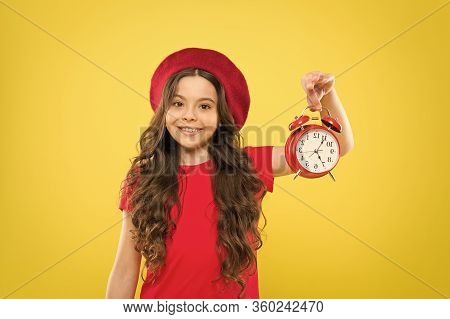 Controlling Personal Time. Schedule And Time. Set Up Alarm Clock. Child Little Girl Hold Red Clock. 