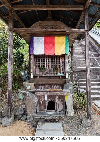 Anan, Tokushima Prefecture, Japan - April 5, 2018: Sacred Well On The Grounds Of Byodoji, Temple Num