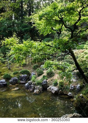 Kochi, Japan - April 6, 2018: Traditional Japanese Garden On The Grounds Of Chikurinji, Temple Numbe
