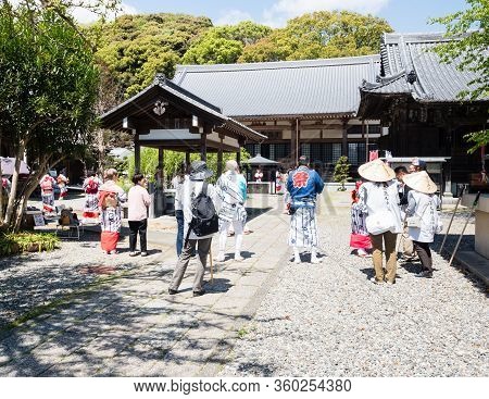 Kochi, Japan - April 7, 2018: Tourists And O-henro Pilgrims Watching Local Festival Performance At S