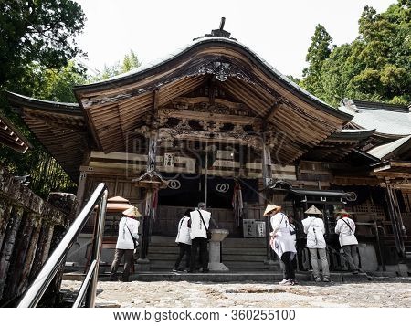 Kochi, Japan - April 7, 2018: O-henro Pilgrims At Kiyotakiji, Temple Number 35 Of Shikoku Pilgrimage