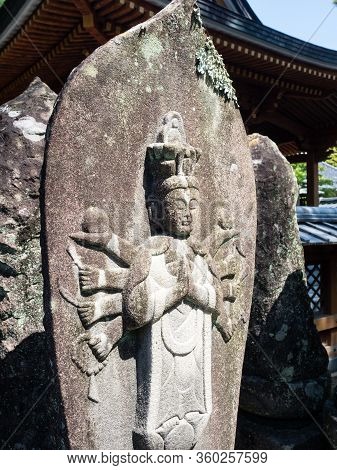 Tosashimizu, Japan - April 8, 2018: Stone Buddhist Statue On The Grounds Of Kongofukuji, Temple Numb