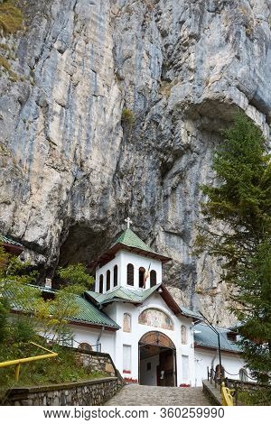 Ialomita Cave Monastery Is Located In Moreni Commune, In The Bucegi Mountains, Romania. The Monaster