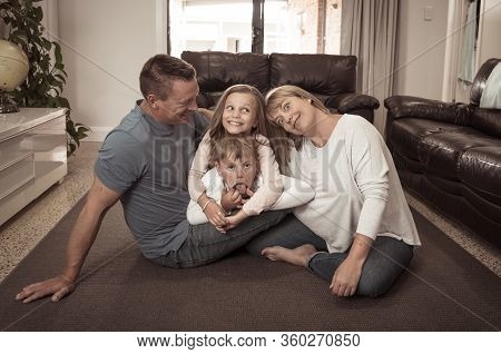 Covid-19 Stay At Home, Save Lives. Family In Staying Home Happy To Stop The Coronavirus Spreading.