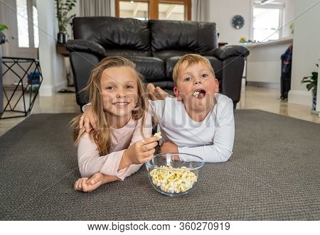 Covid-19 Pandemic - Lockdown. Stay At Home, Save Lives. Happy Caucasian Boy And Girl Together In Iso