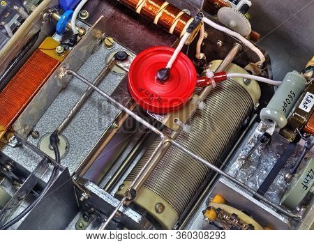 Inside View Of High Frequency Power Amplifier With Capacitors, Coils And Other Components