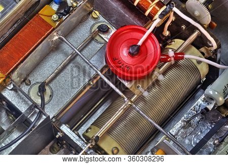 Inside View Of High Frequency Power Amplifier With Capacitors, Coils And Other Components