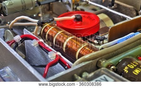Inside View Of High Frequency Power Amplifier With Capacitors, Coils And Other Components