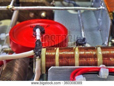 Inside View Of High Frequency Power Amplifier With Capacitors, Coils And Other Components