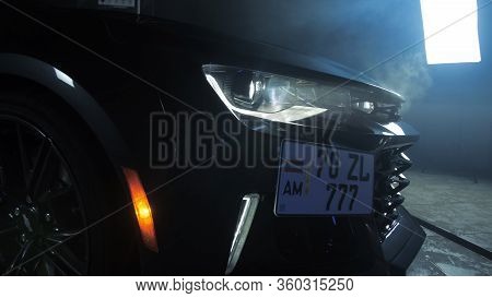Tomsk, Russia - March 30, 2020: Chevrolet Camaro Zl1 The Exorcist Headlight Close-up Side View