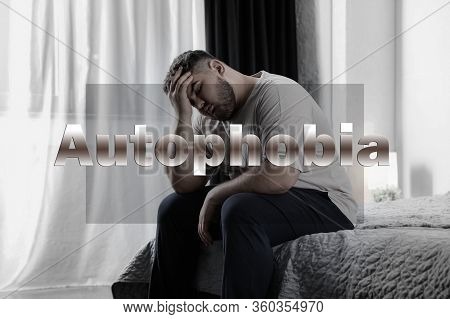 Depressed Overweight Man Sitting Alone On Bed At Home. Autophobia