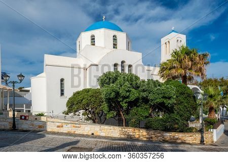 Ttraditional whitewashed orthodox christian church in of Naousa town in famous tourist attraction Paros island, Greece