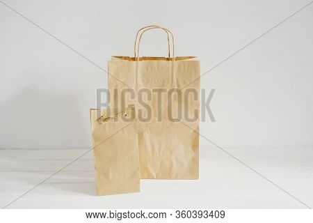 Packages Of Environmentally Friendly Material. Eco-packing. Kraft Packages Of Two Sizes.