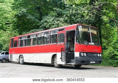 Sochi, Russia - July 25, 2009: Red Touristic Coach Bus Ikarus 256 In The City Street.
