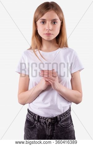 Attractive Caucasian Teen Girl With Fair Healthy Hair And Clear Healthy Skin In Casual White T-shirt