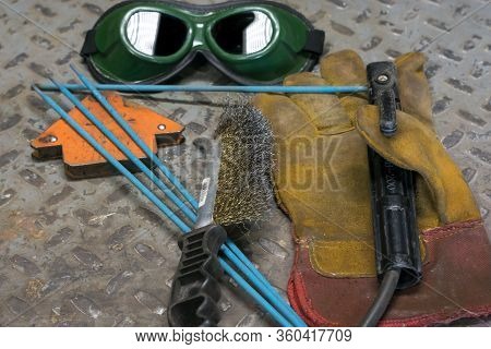 Welding Machine, In The Workshop, Welding Mask, Leather Gloves, Welding Electrodes, High-voltage Wir