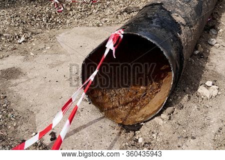repair and replacement main pipeline of heating systems, district heating pipes network, water supply or Sewerage in city, removing old pipes and replacing them with new ones in a hole in the ground
