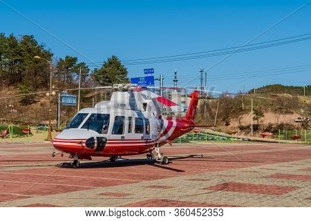 Hwanggan, South Korea; April 8, 2020: Port Side View Of Sikorsky S76c+ Helicopter Parked On Helipad 