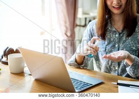 Bussiness Worman Work From Home Wearing Protection Mark In Covid-19 Virus Situation. Her Working In 