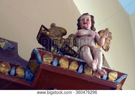 LAZ, CROATIA - JULY 14, 2014: Angel statue in Saint Andrew's Church in Laz, Croatia