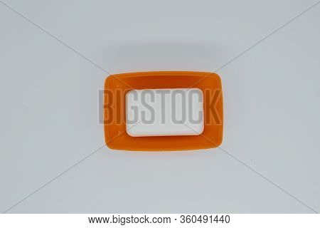 Soap In Boxing On A Light Background Close-up. View From Above