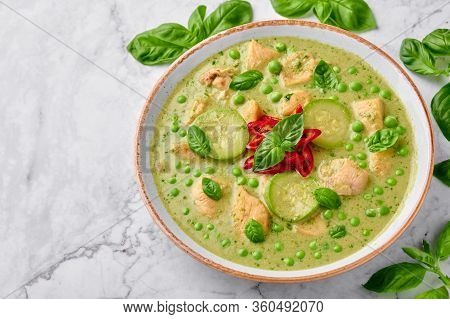 Thai Green Curry With Chicken Or Gaeng Kaew Wan Gai On White Marble Background. Thai Green Curry Is
