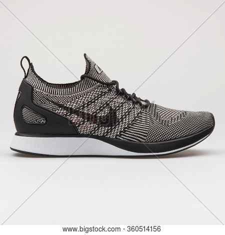 Vienna, Austria - August 16, 2017: Nike Air Zoom Mariah Flyknit Racer Black And Grey Sneaker On Whit