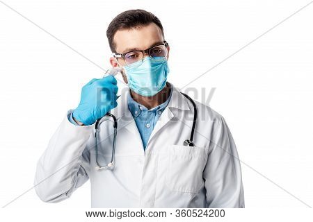 Doctor In Medical Mask And White Coat Using Pyrometer Isolated On White