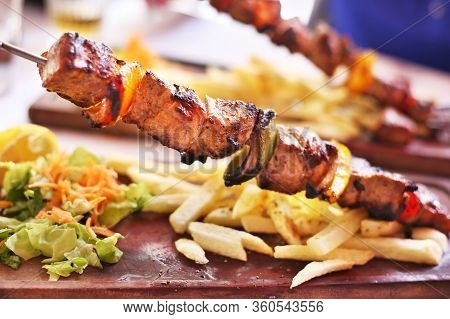Traditional Greek Souvlaki With Chicken And Potatoes - Greek Kontosouvli - Greek Cuisine