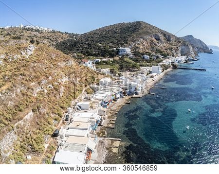 Aerial View Of Klima Beach With Krypti Village In Background, Milos, Greece